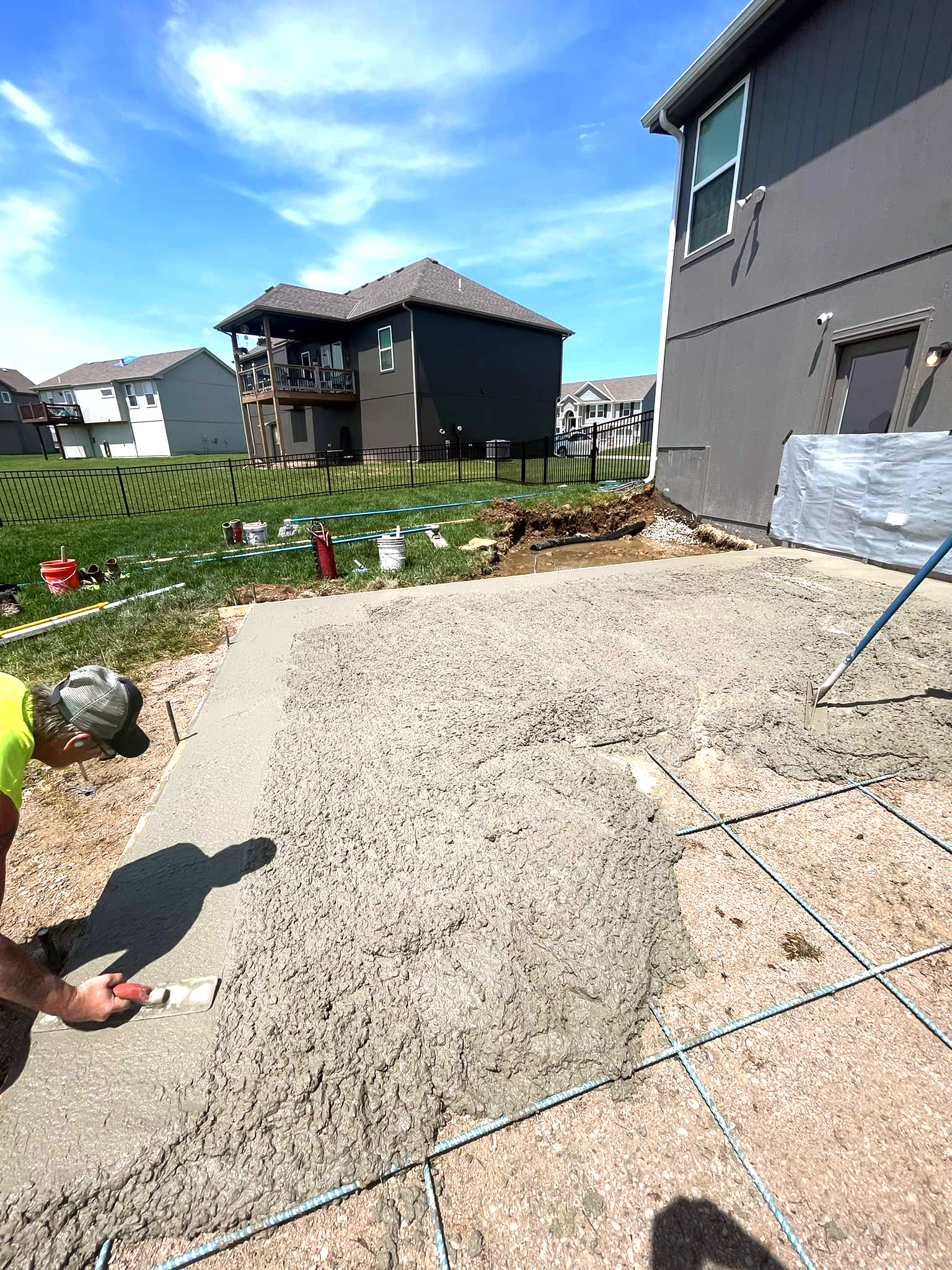 Crew working on wet concrete