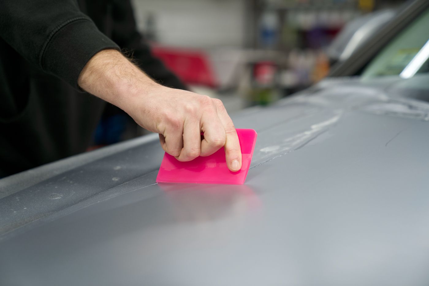 A person is applying a PPF