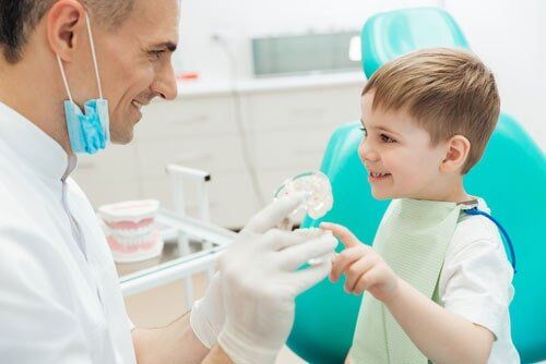 Child with Dentist — Dental Services in Gympie, QLD