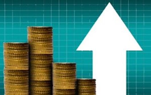 cash coins in a pile with upward pointing arrow