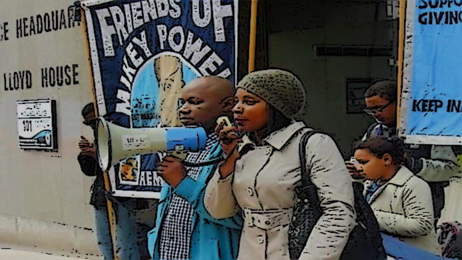Members of Mikey Powell family speak at protest