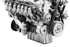 Black and white close-up of a large diesel engine with belts, pulleys, and various components visible. | AAA Full Service Auto Care