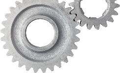 Two metal gears meshing together. | AAA Full Service Auto Care