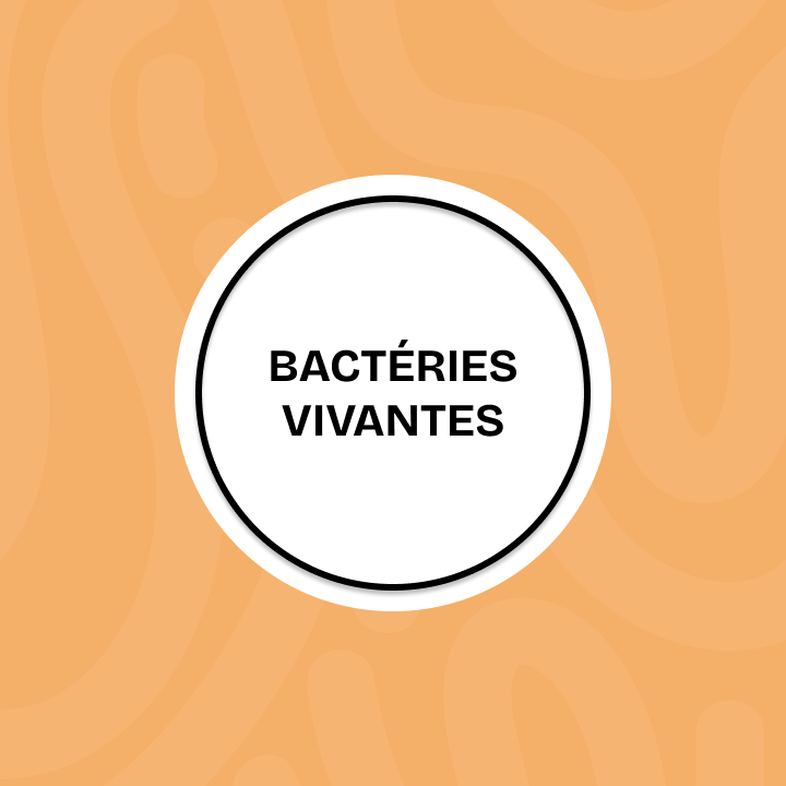 Un cercle blanc sur fond orange, avec le texte noir « BACTÉRIES VIVANTES » centré à l'intérieur.