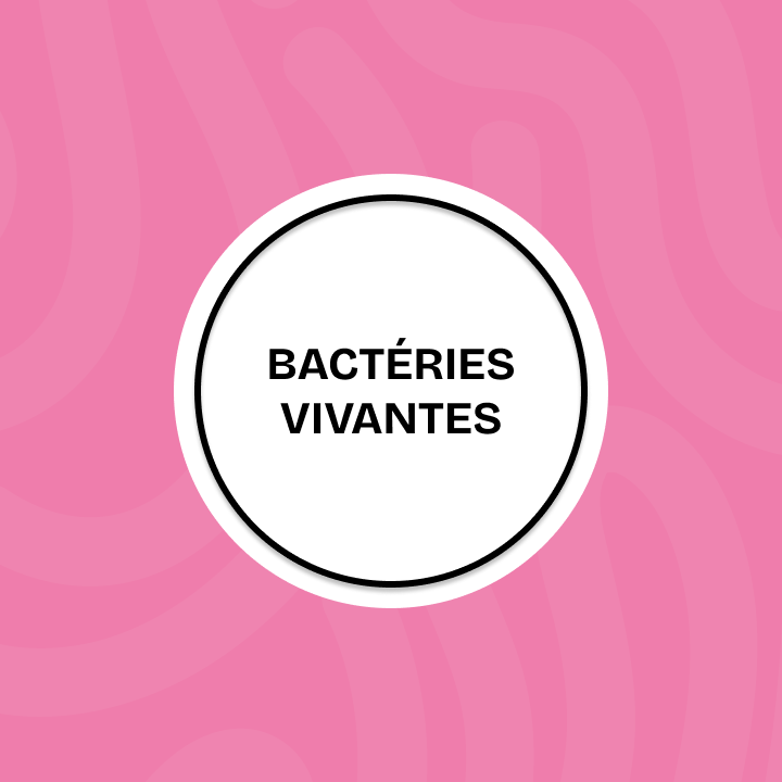 A white circle with a black border on a pink background, containing the black text "LIVE BACTERIA".