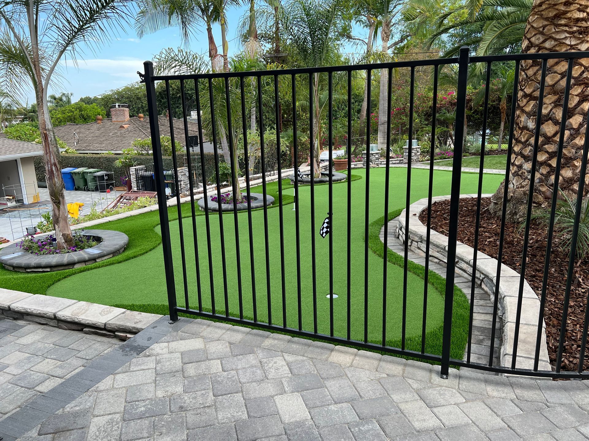 synthetic putting green and wrought iron HH