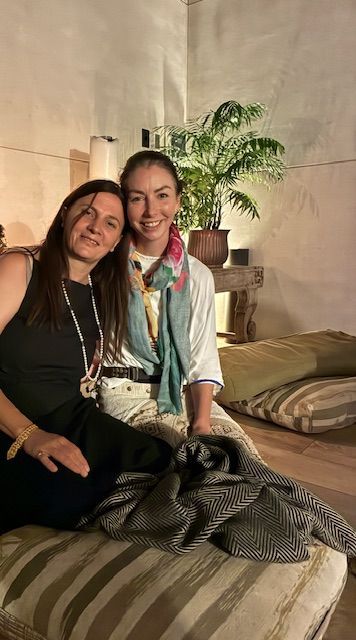 A group of eight people sit in a circle in a living room for a meeting — Vedic Meditation & Coherence Personal Counselling in Coffs Harbour, NSW