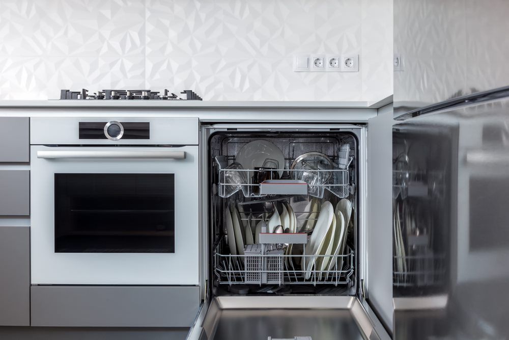 Fully Stocked Dishwasher — Appliance Repairs in Mackay, QLD