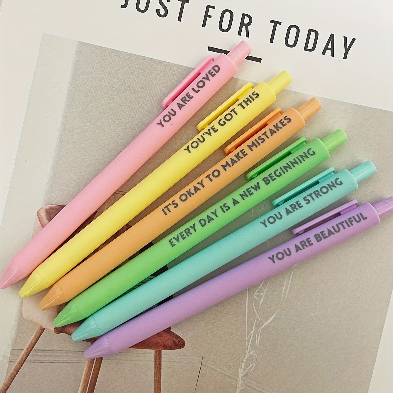 A bunch of pens that say just for today