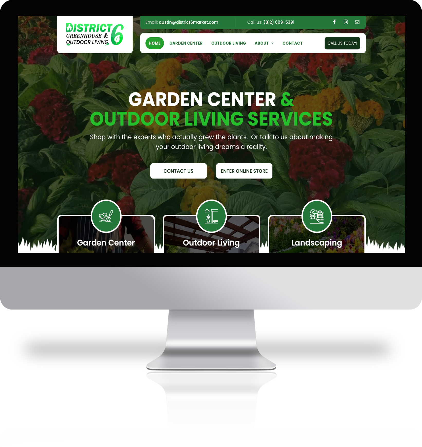 A computer monitor with a garden center and outdoor living services website on it.