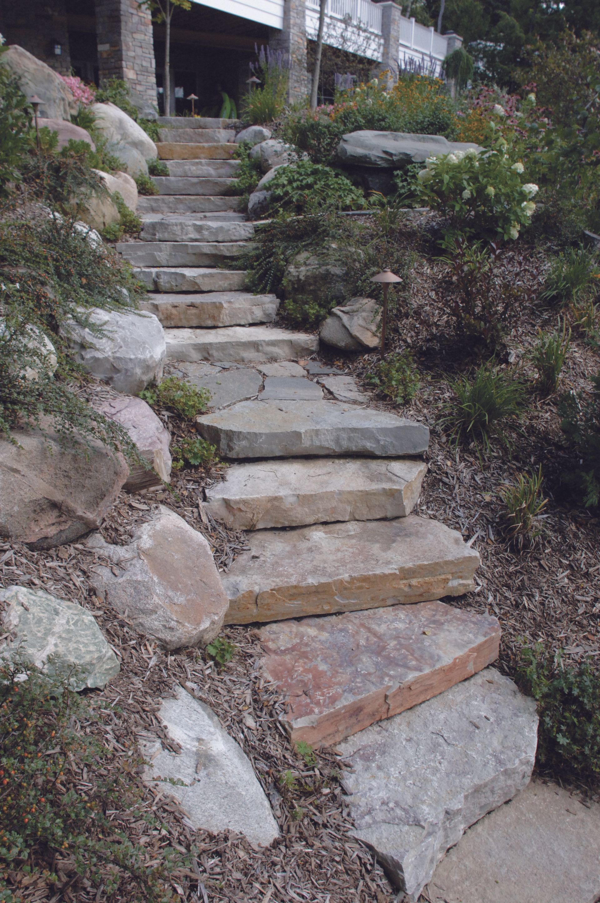 A set of stone steps leading up to a house