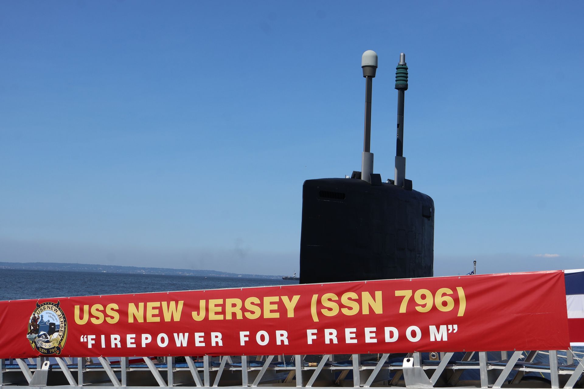 USS New Jersey submarine with banner reading 