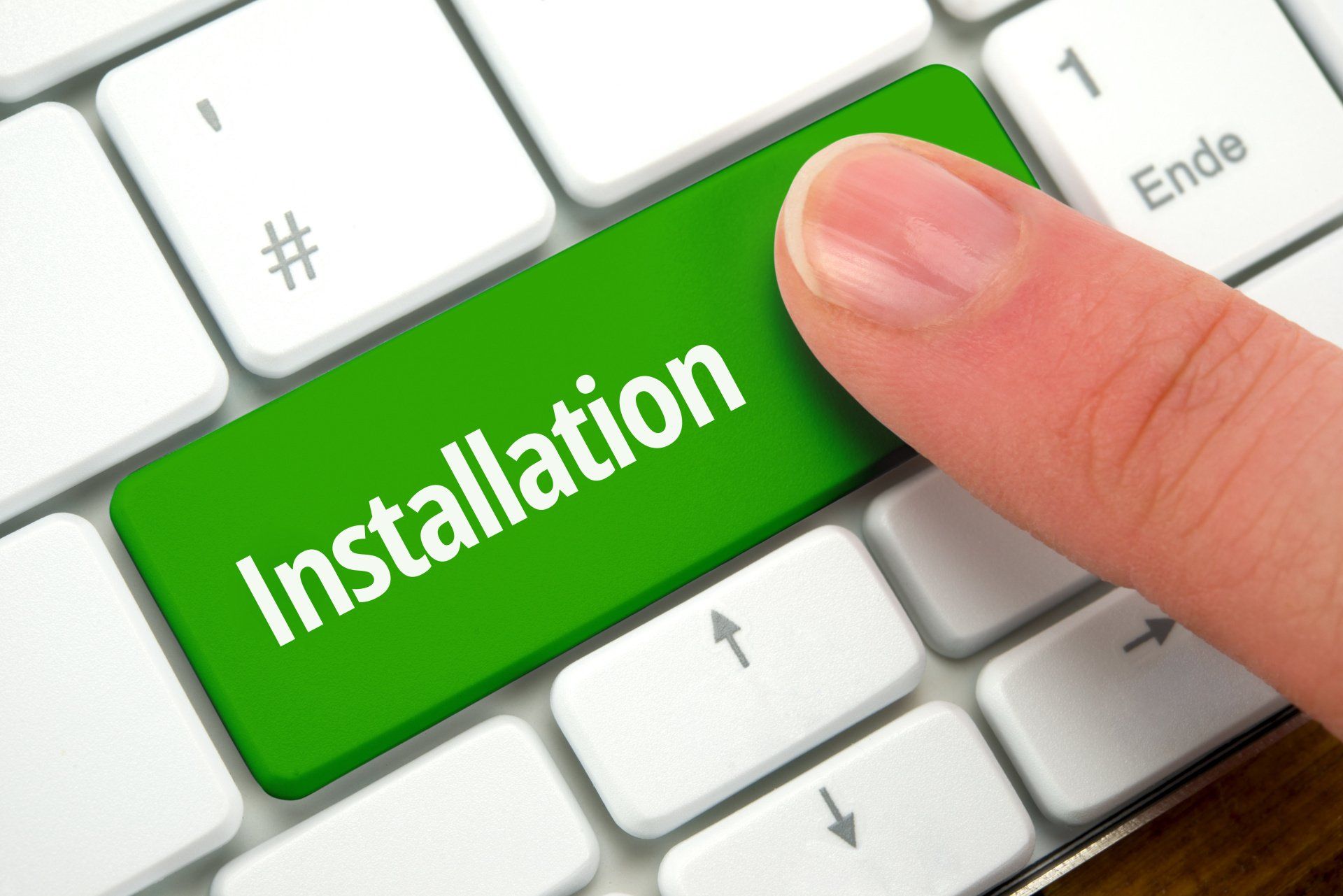 a keyboard button with the word 'installation' printed in it