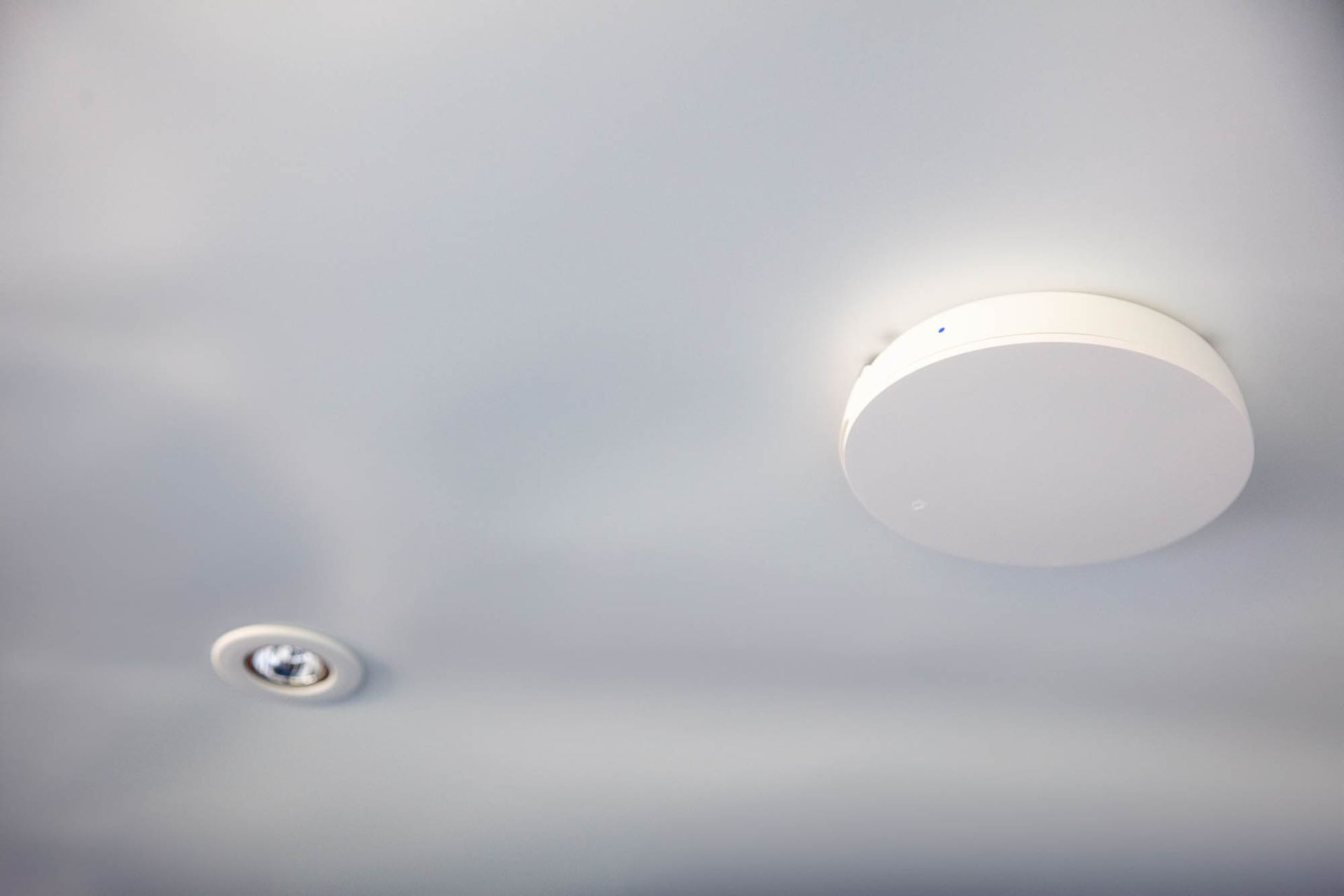 Photograph of Control4 Araknis Networks Wi-Fi 6 Wireless Access Point and Collingwood LED Downlight