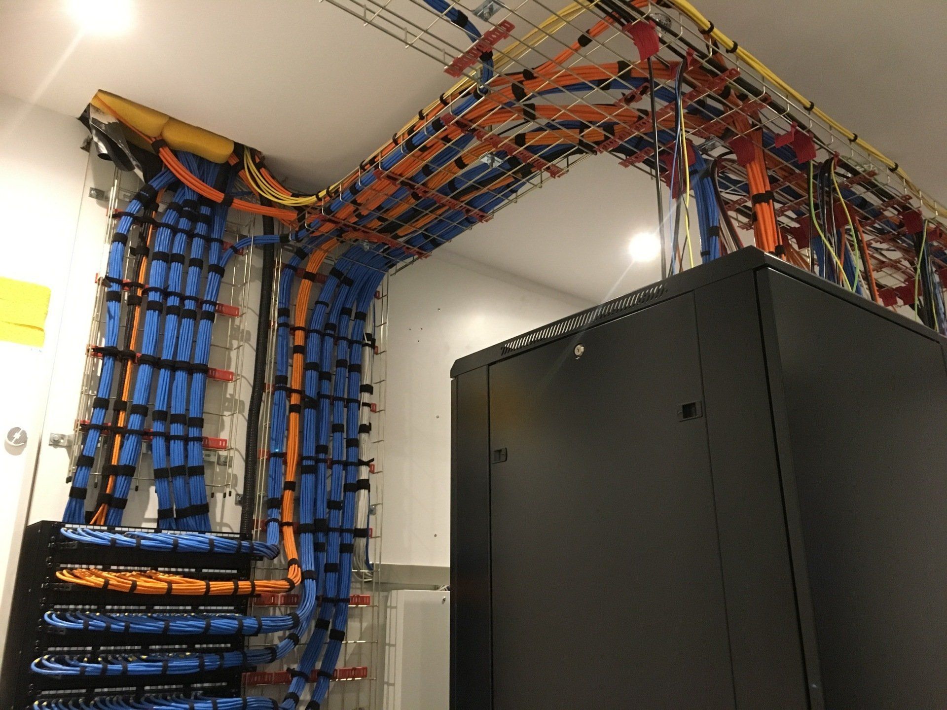 Photograph of patch cables running to server racks