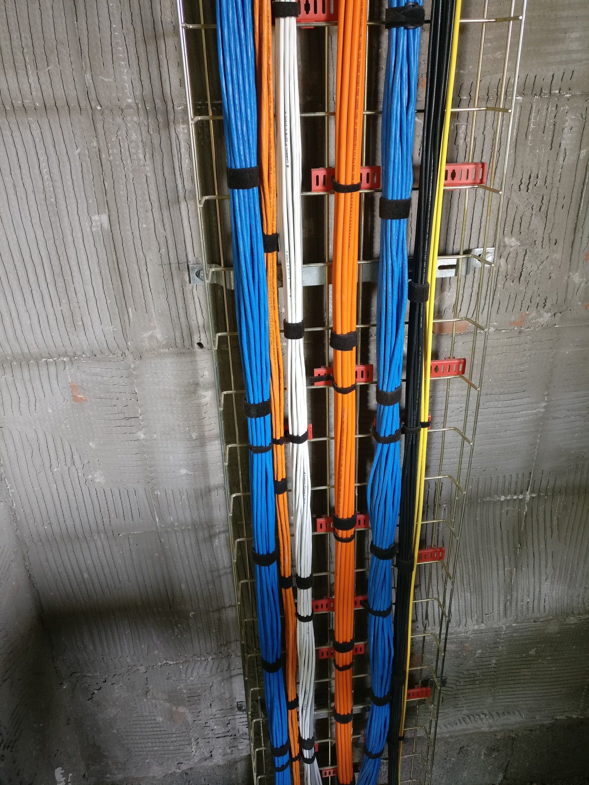 Photograph of pre-wire cables attached to basket tray
