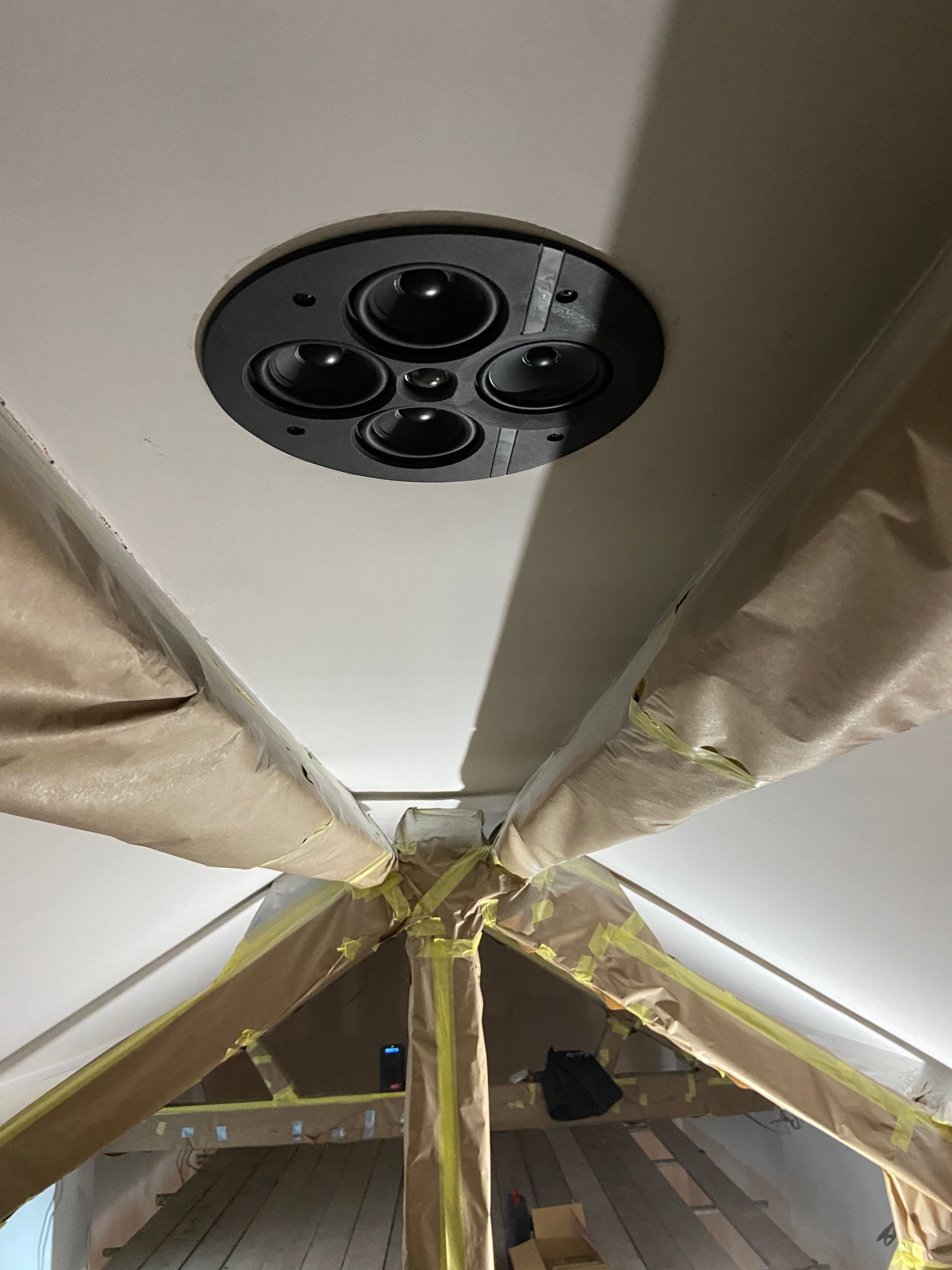 Photo of Speaker installed into ceiling without cover grill