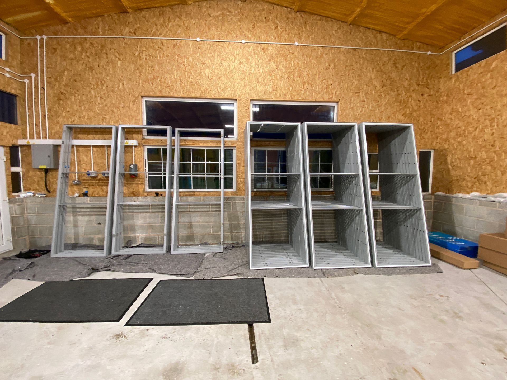 Photograph of exhibition display system panels being assembled
