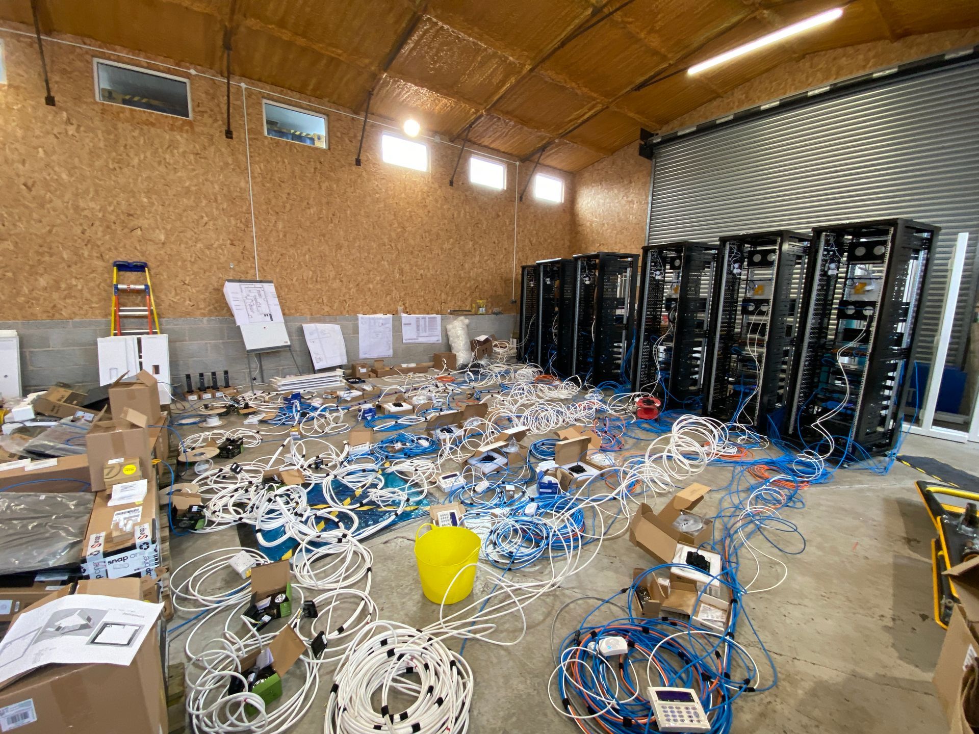 Photograph of wiring looms removed from exhibition panels so that we can fully soak test equipment in workshop