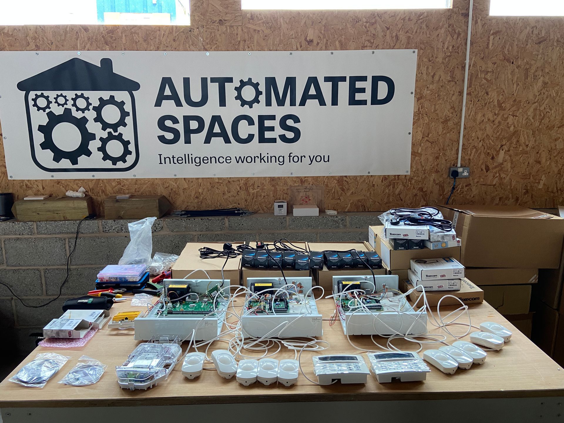 Photo of Bench testing of intruder alarm on work bench at a workshop