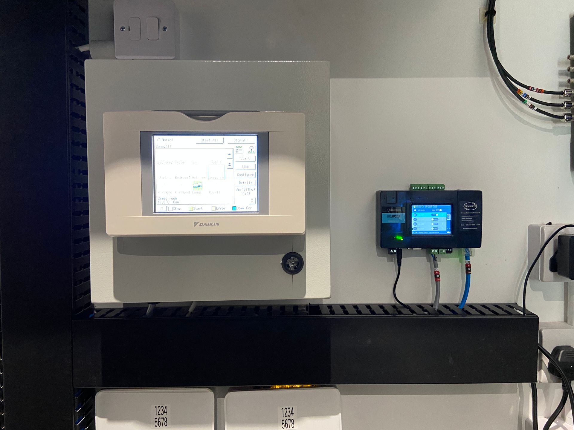 Photo of air con control panel and heating integration system