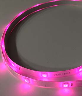 A photograph of a colour change LED strip light fixture that is currently pink in colour