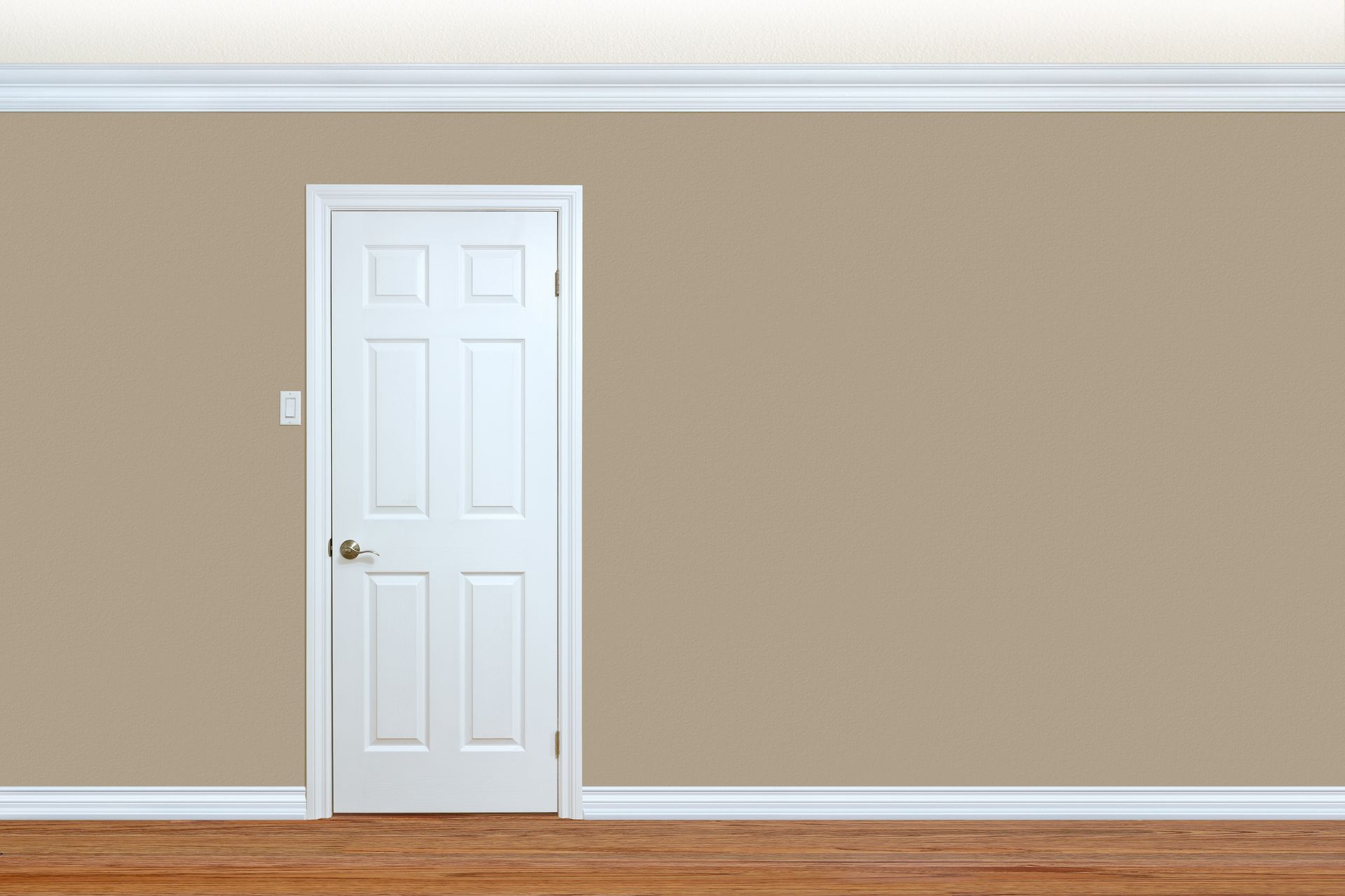 An image of a bedroom wall with a door, showcasing meticulous trim repair.