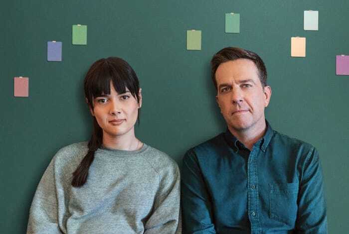 A movie poster for Together Together showing two people sitting next to each other.