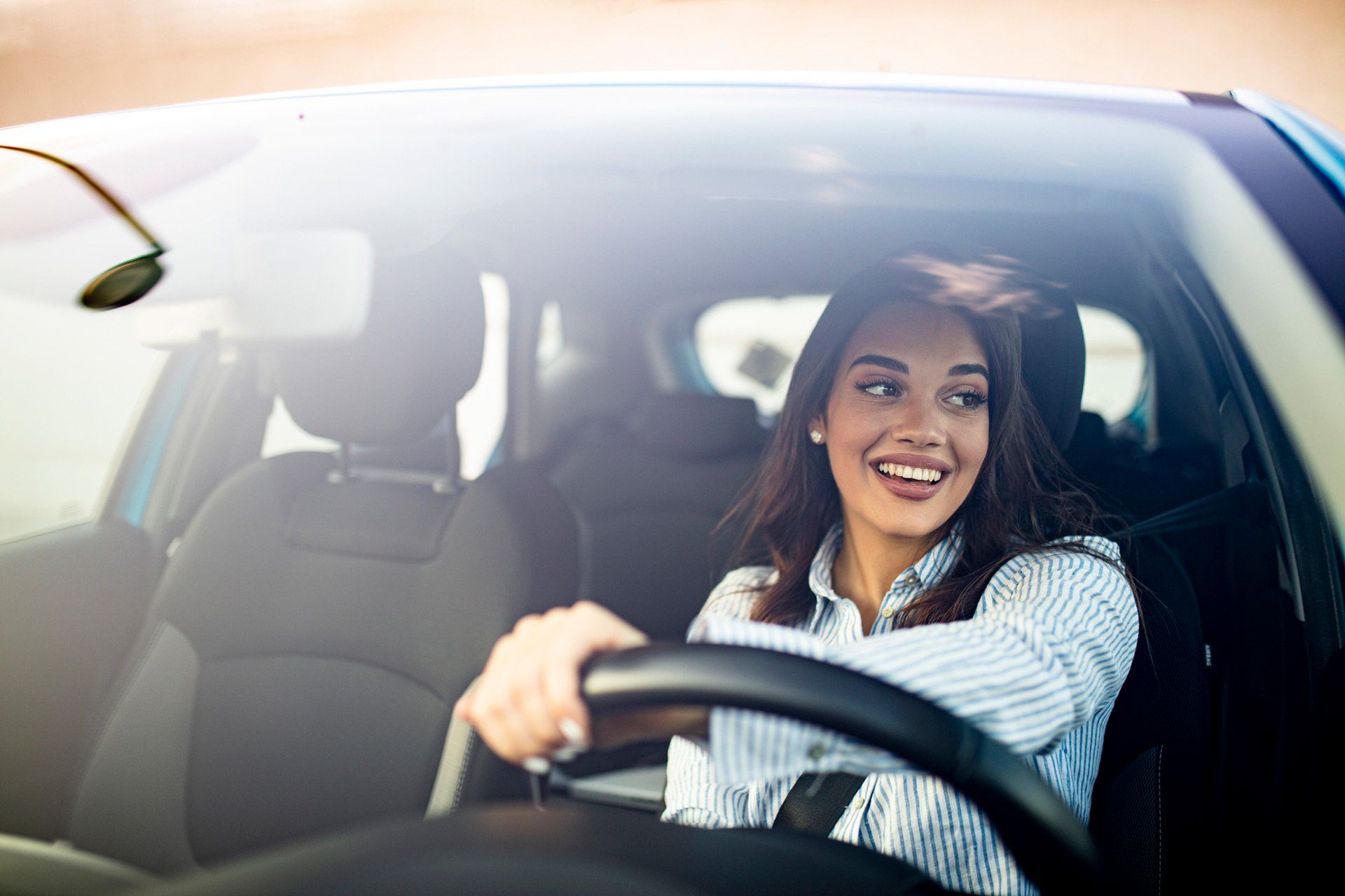 Happy Woman Driving Car — Auburn, WA — Gary Turner Insurance