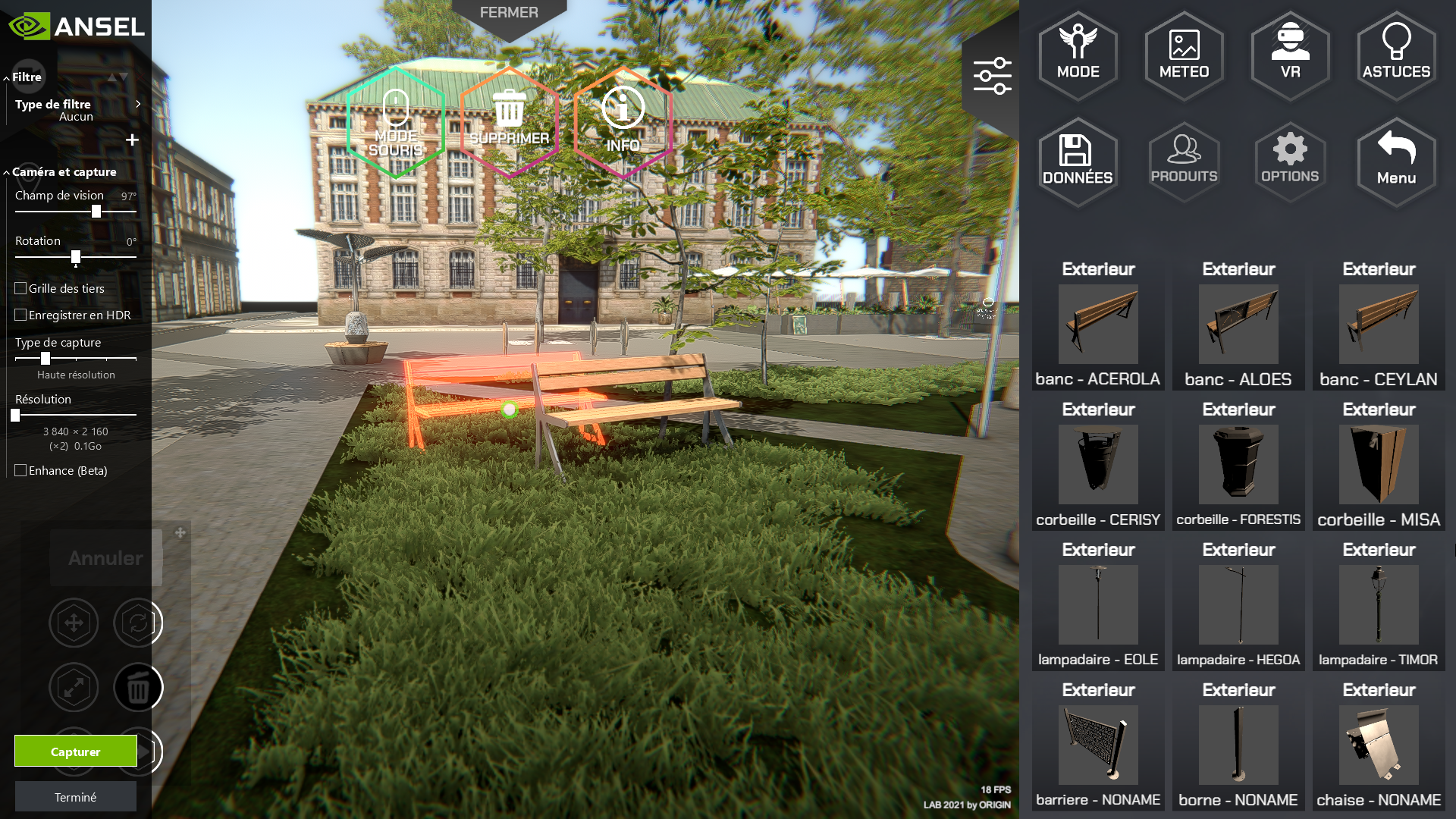 Un écran d'ordinateur montre un parc avec une table de pique-nique et un bâtiment en arrière-plan.