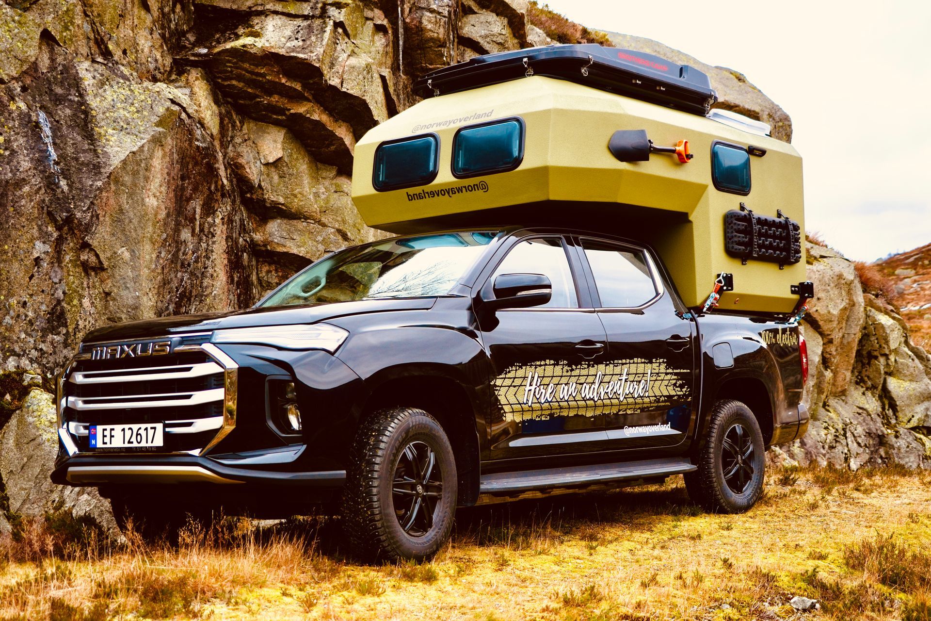 A pickup camper from Norway Overland blends right into the Norwegian landscape.