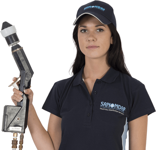 Woman in a uniform holding a cleaning tool; the company logo is on her shirt and hat.