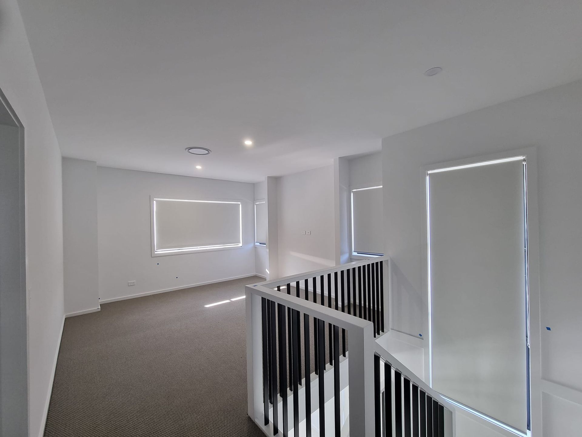 There is a staircase leading up to the second floor of a house.