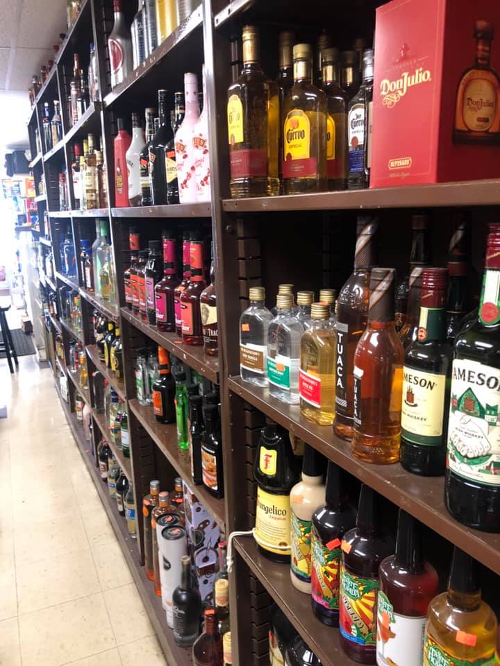 A liquor store filled with lots of bottles of liquor