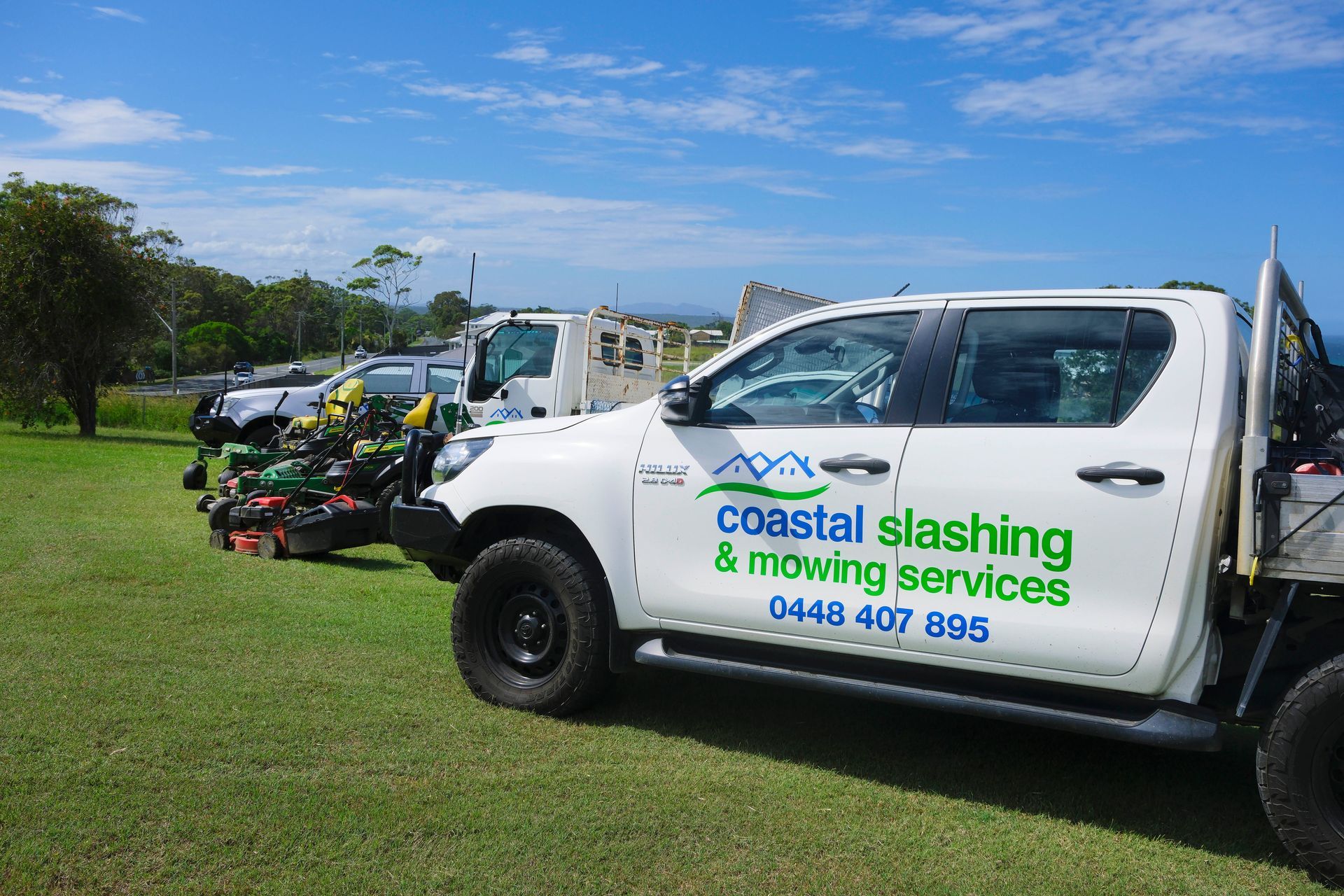 A White Pickup Truck Labeled Coastal Slashing & Mowing Services — Coastal Slashing & Mowing Services In Tallwoods Village, NSW