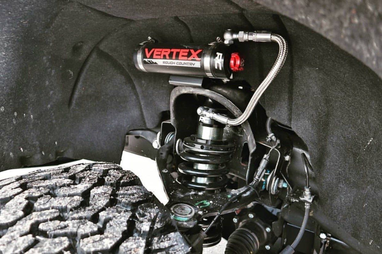 A close up of a vertex shock absorber on a car | CB Wheels & Tires, 4x4, Suspension, Center