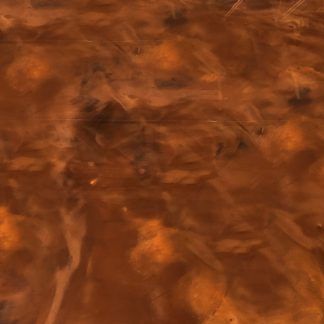 A close up of a brown surface with a swirl pattern.