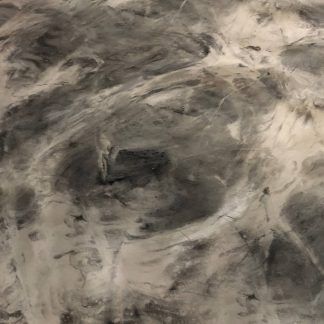 A close up of a gray and white marble floor.