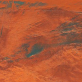 A close up of a red and green painting on a wall.