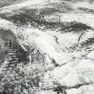 It is a black and white photo of a river.