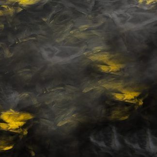 A close up of a black and yellow painting with smoke coming out of it.