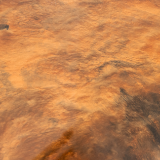 A close up of a brown colored concrete surface.