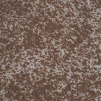 A close up of a brown and white carpet with a camouflage pattern.
