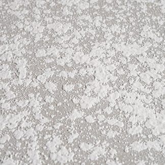 A close up of a white powdered sugar surface.