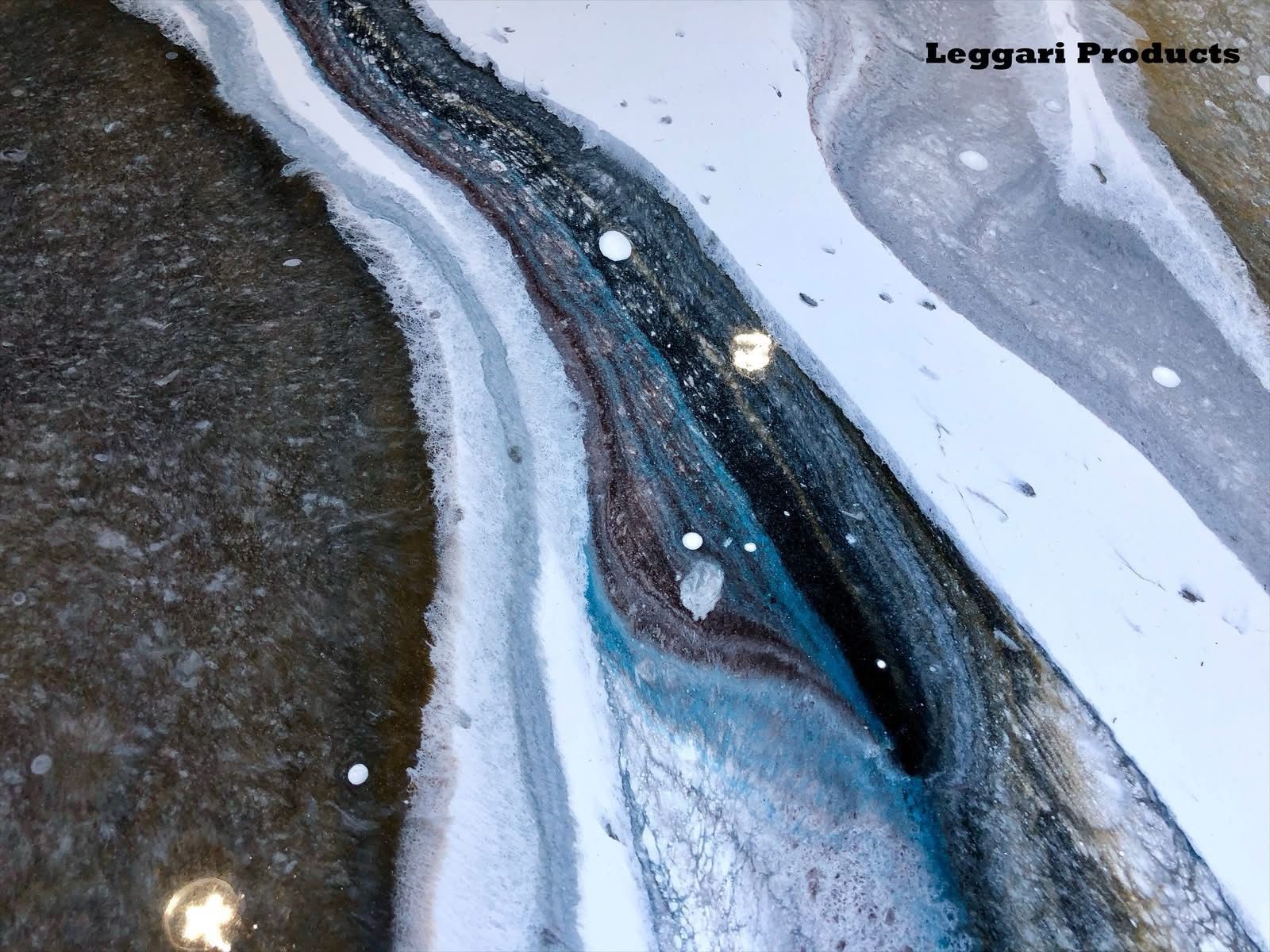 A close up of a painting with the words leggurl products written on the bottom