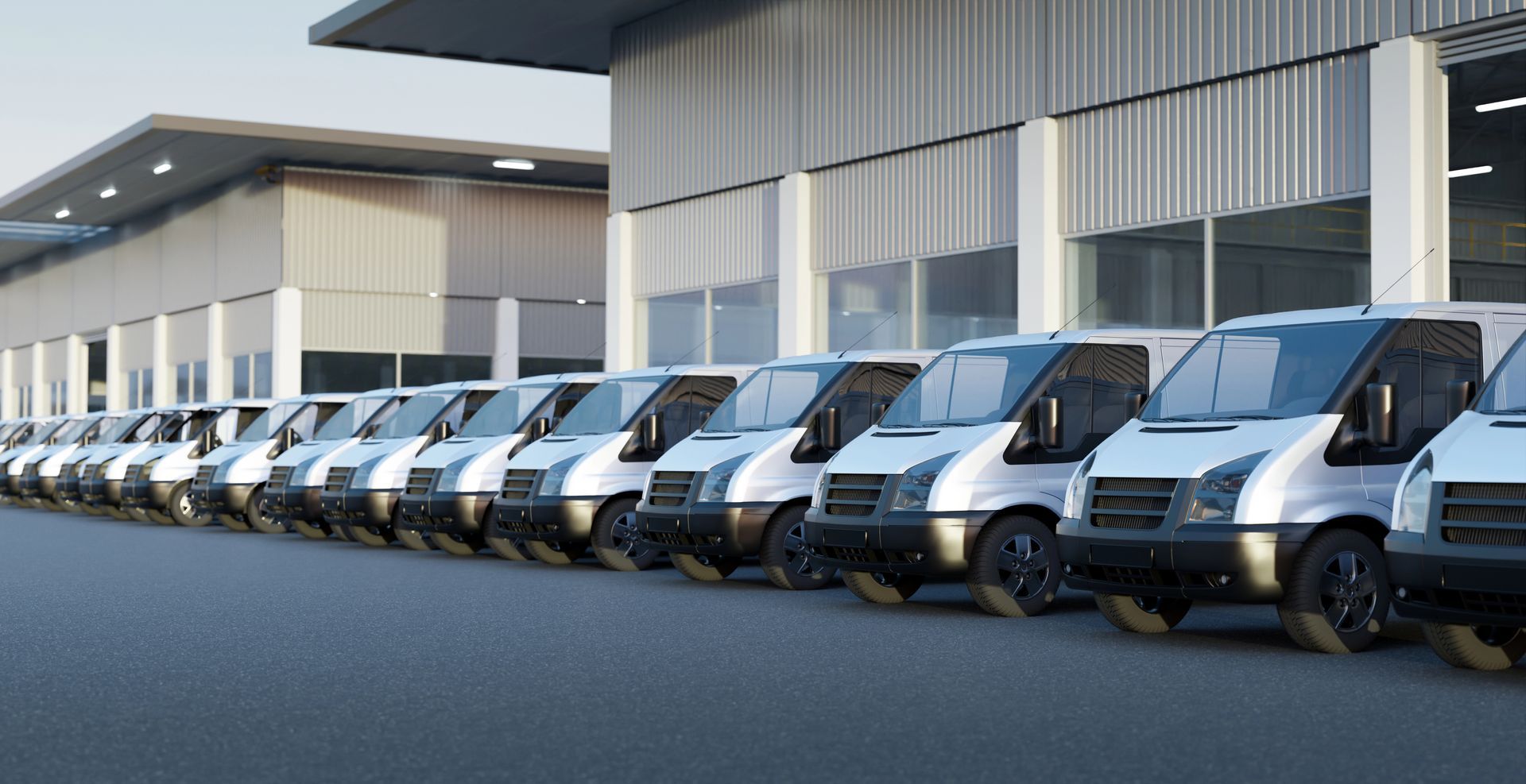 Small white commercial vans