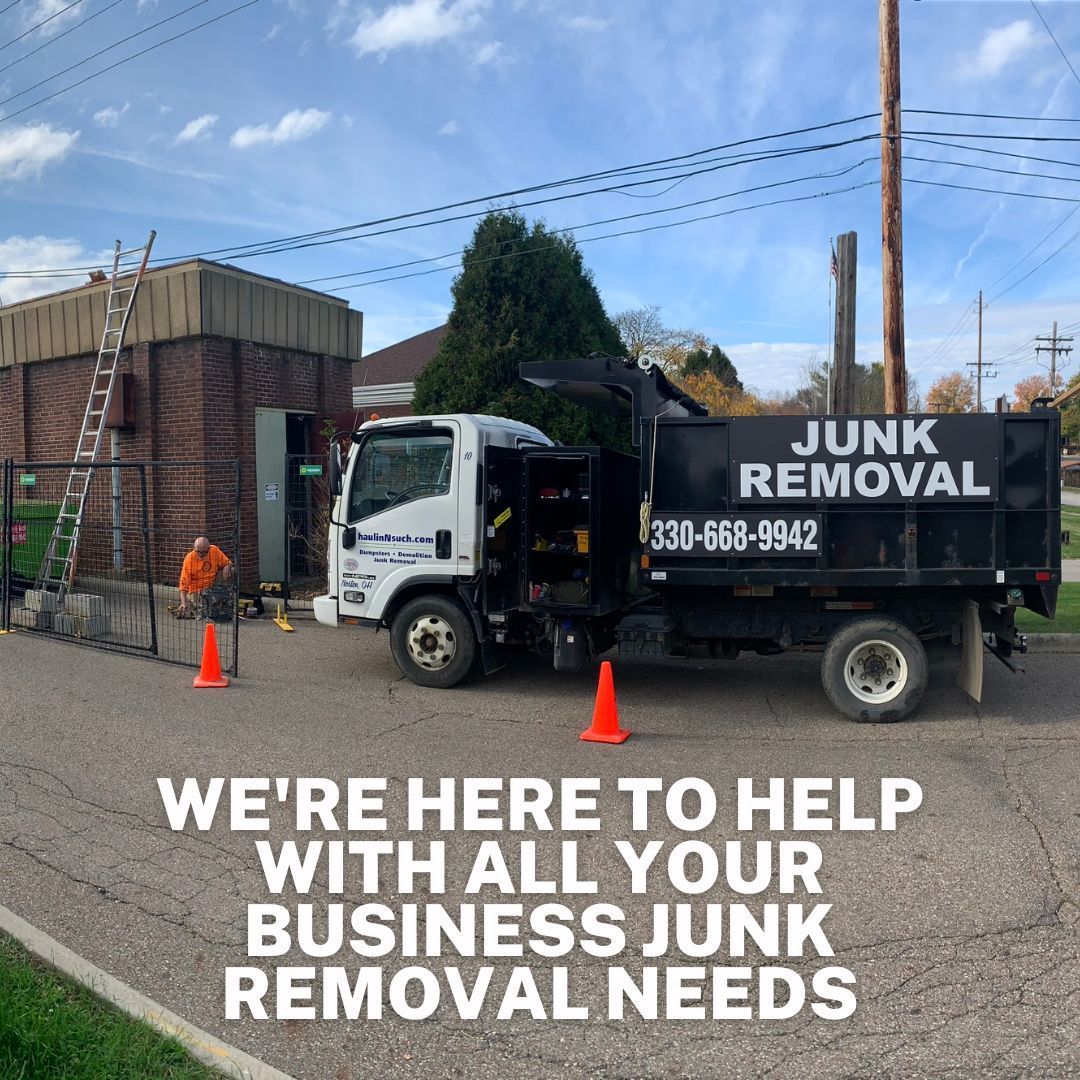 A junk removal truck with phone number 330-668-9942 parked by a brick building. Text reads: Help with business junk needs.