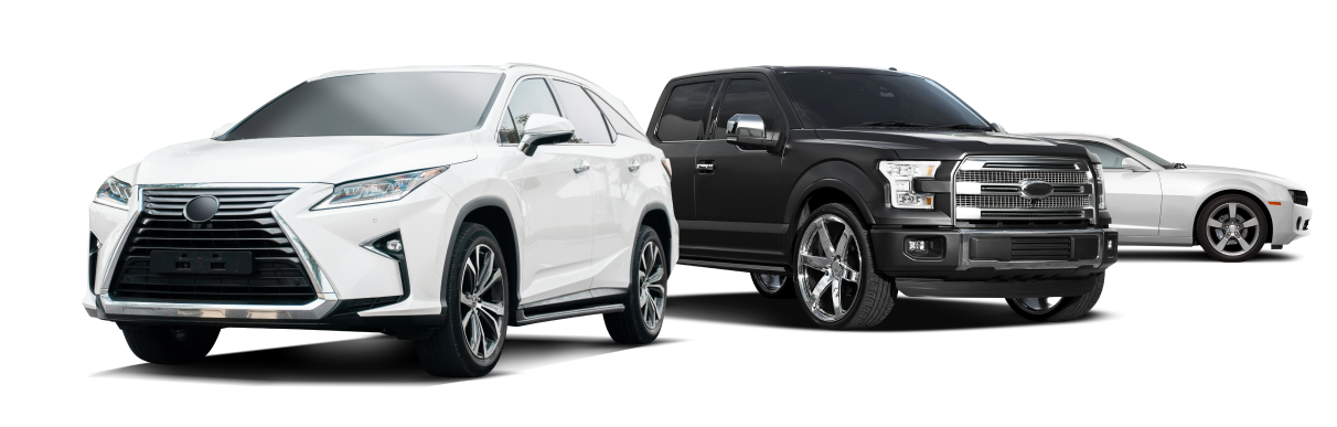 Three cars: a white SUV, a black SUV, and a silver sports car, all parked in a row. | Bloomfield Garage