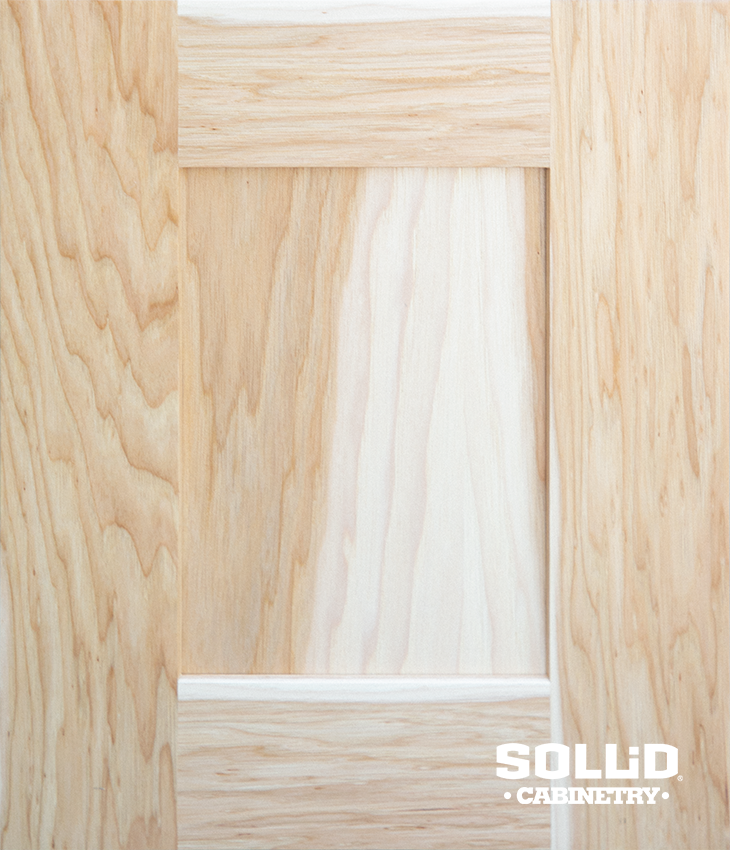 A close up of a piece of wood with a hole in it.