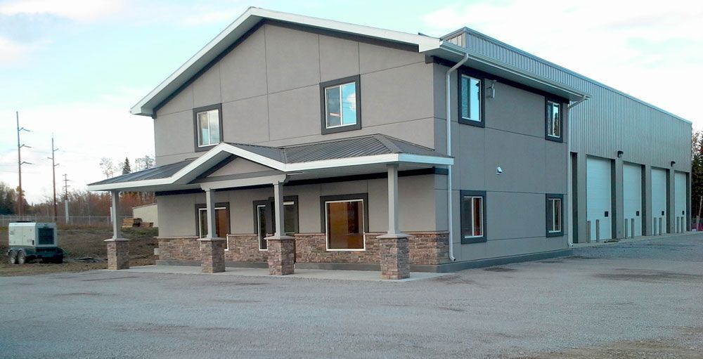 A large building with a lot of windows and doors